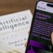 The 5 Best Books for Learning Machine Learning Mathematics Close-up of a smartphone displaying ChatGPT app held over AI textbook.